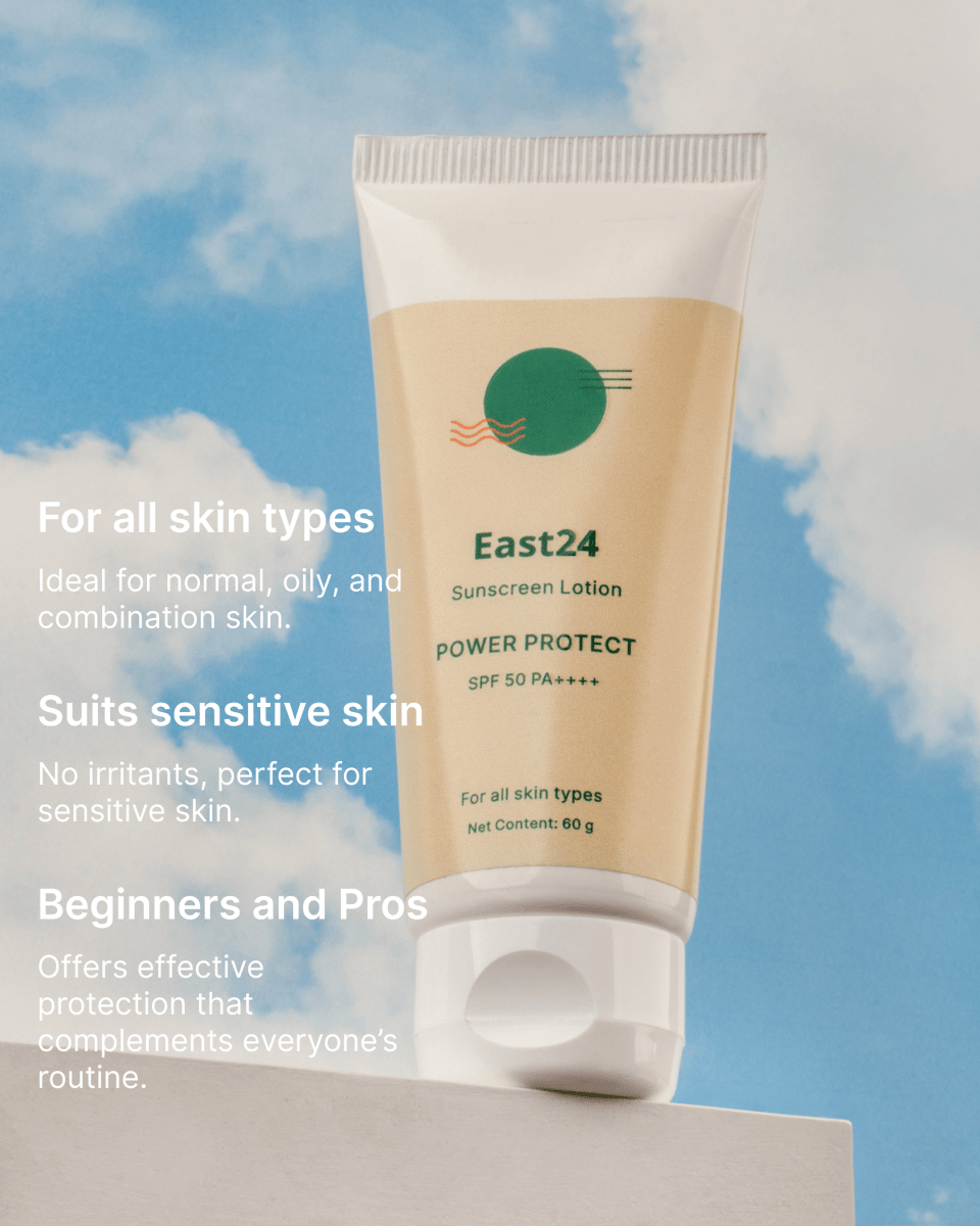 East24 SPF 50 PA++++ sunscreen lotion tube with blue sky and clouds in the background