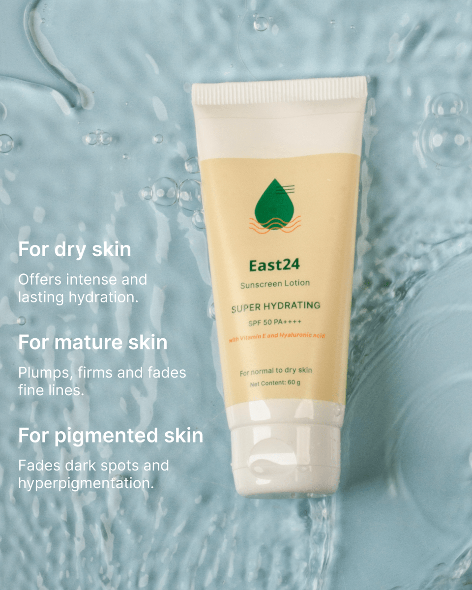 Tube of East24 Super Hydrating SPF 50 PA++++ for all skin types with water droplets on a blue background